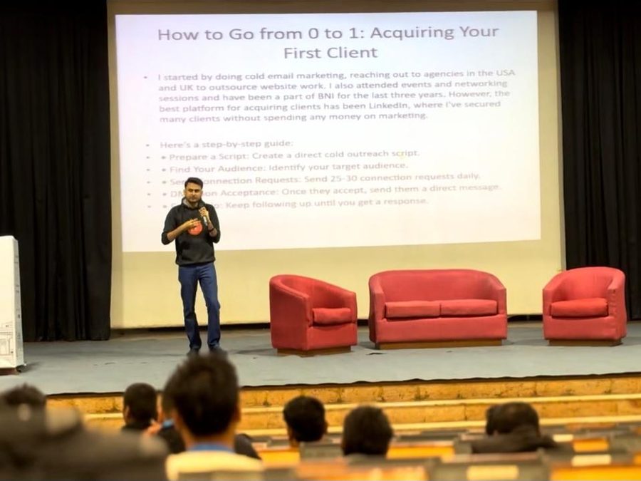 Aditya Singh speaking on stage at WordCamp Delhi 2024